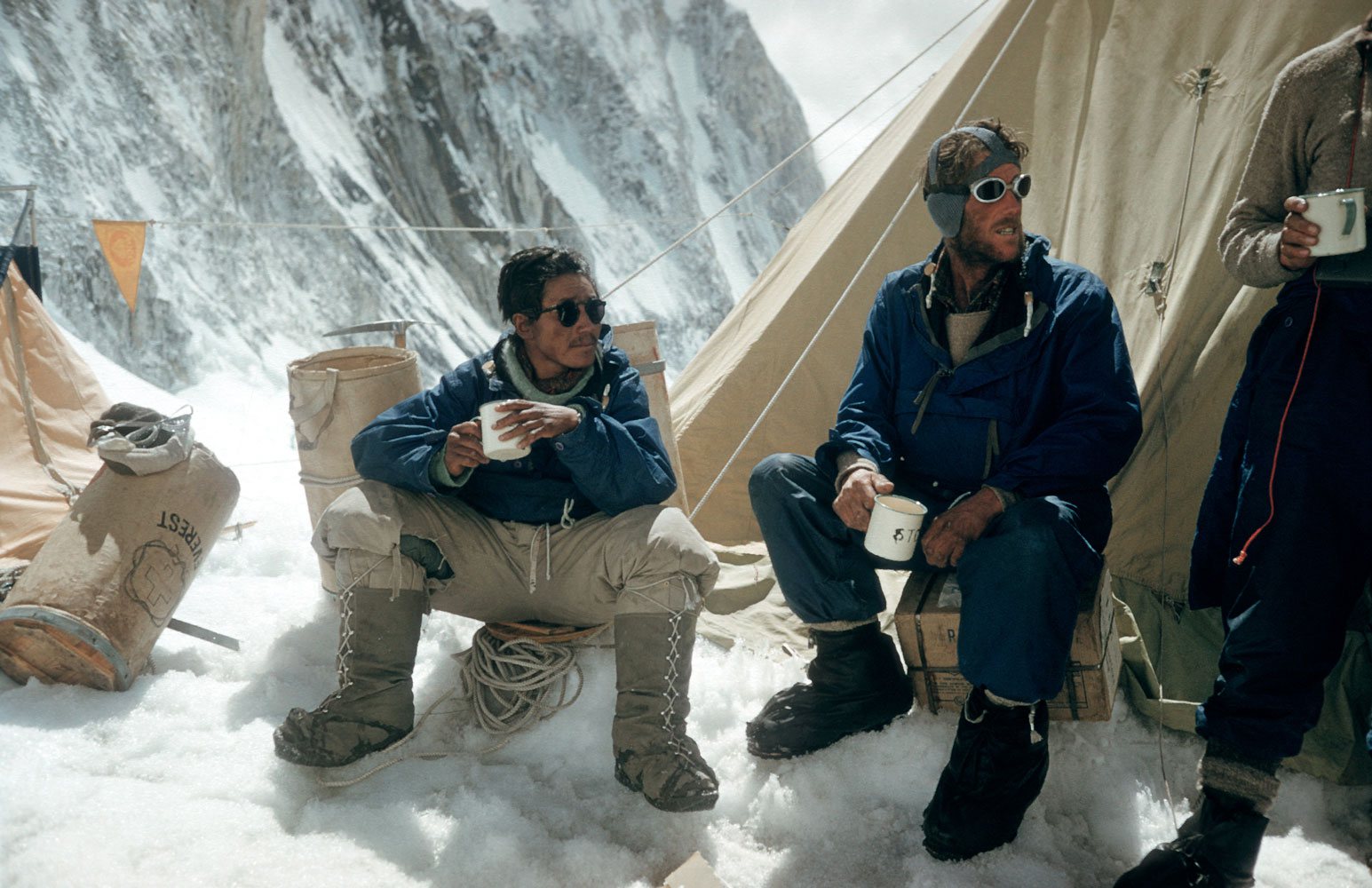 Celebrating their conquest of everest with a cup of tea